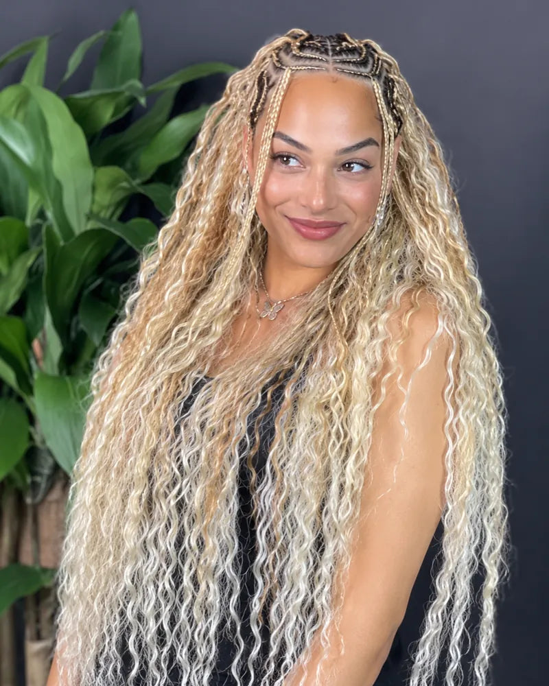 Model wearing Sunzol Beach Curls in colour 27/613